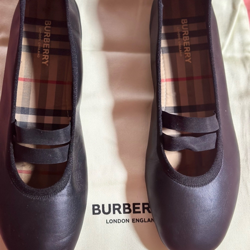 Authentic Burberry ballerina flats gently used.
